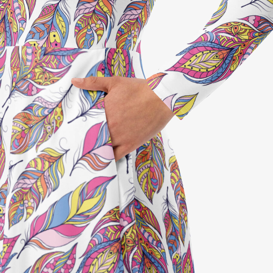 Close-up of the feather print dress pocket showing intricate colorful feather patterns and soft fabric texture.