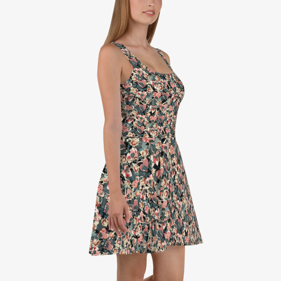 Side view of the Midnight Petal Skater Dress showing the contoured fit, flared skirt, and layered heart and floral graphic textures.