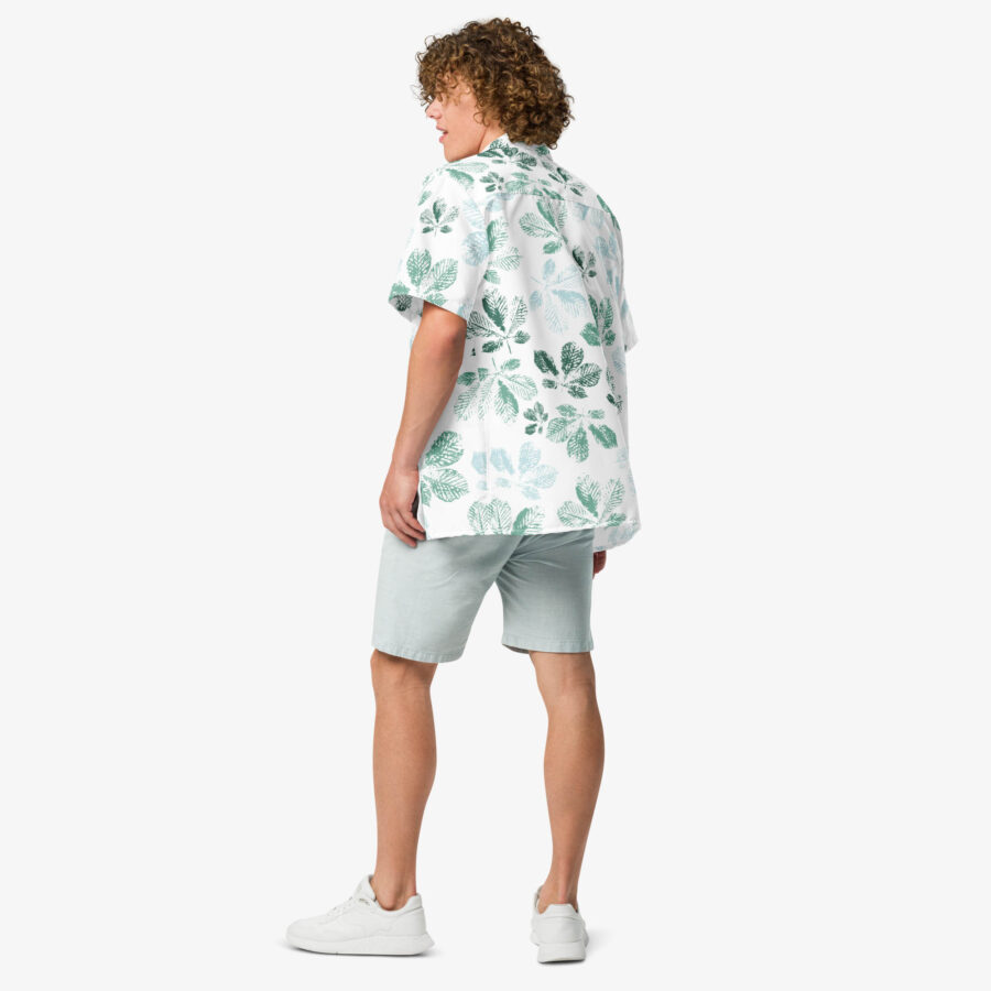 Man wearing the Mistleaf Botanical Button Shirt from the back, showcasing the relaxed fit and leafy green print against a clean white background.