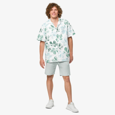 Man facing forward wearing the Mistleaf Botanical Button Shirt paired with light shorts and white sneakers, highlighting the shirt’s airy design.