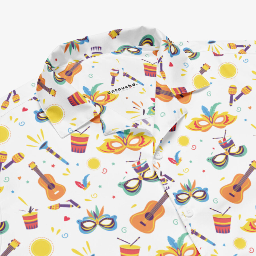 Close-up of the Carnival Harmony Button Shirt collar showing the "untouchd." branding and crisp details of the colorful mask and instrument motifs.