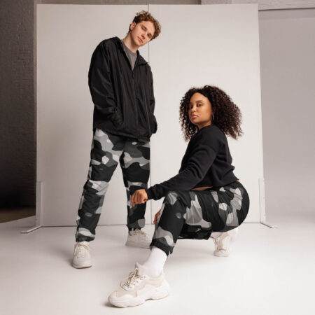 The phantom drift camo track pants fuse grayscale camo with utility details and breathable comfort, crafted for movement and everyday edge. dou view